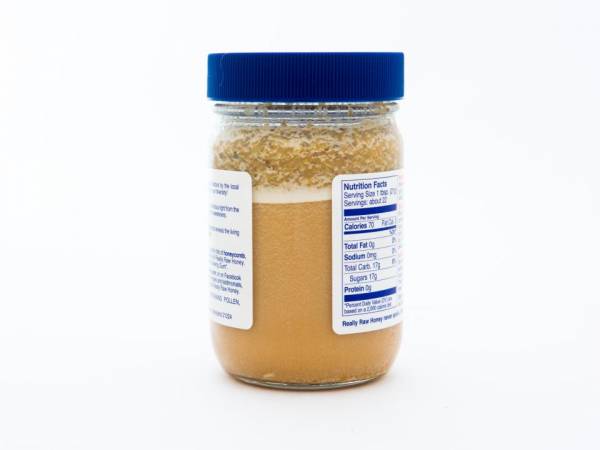 1 lb. Glass Jar of Really Raw Honey with an extra amount of our cappings on top.